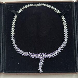 Leaf cluster shape necklace with purple jewels